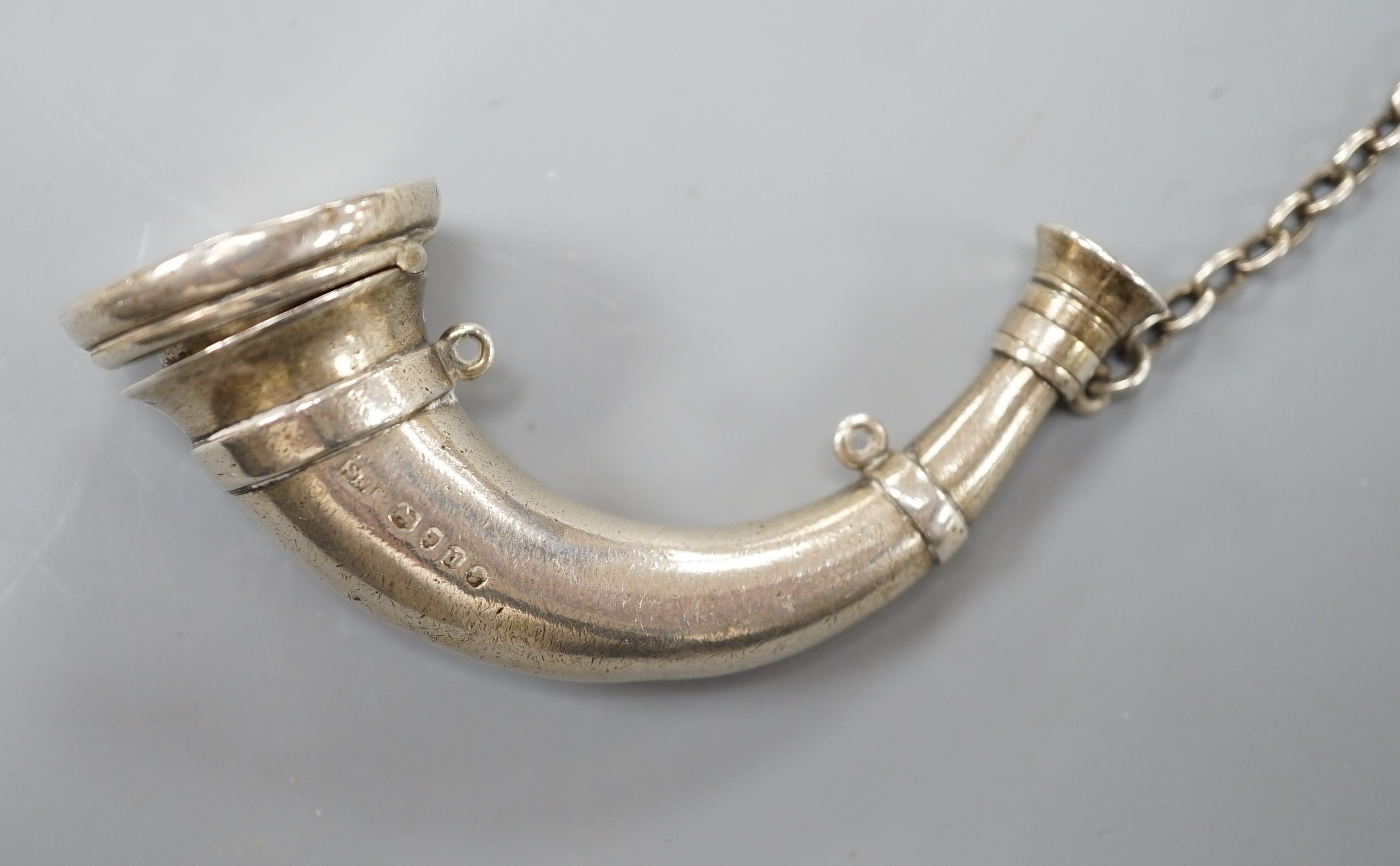 A Victorian silver combination vinaigrette/scent flask modelled as a bugle, makers Sampson Mordan, London 1875, 7.5cm, 32 grams